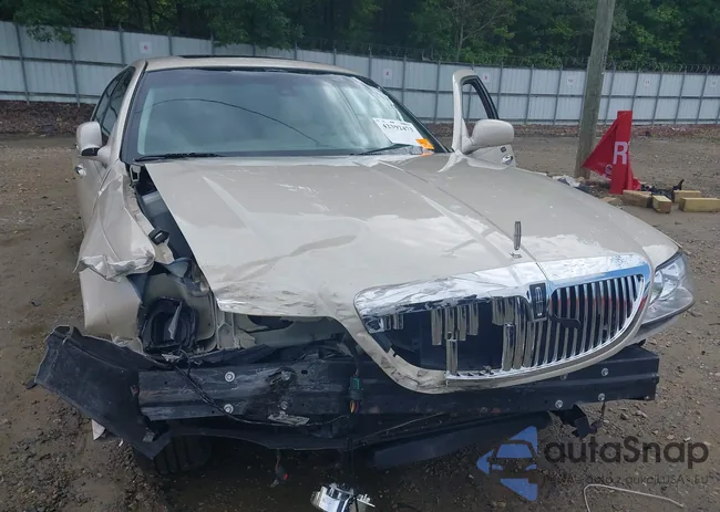 1LNHM83W33Y608733: 42392473