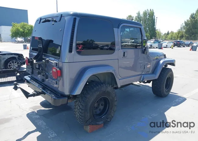 1J4FA59S4YP737885: 42398329