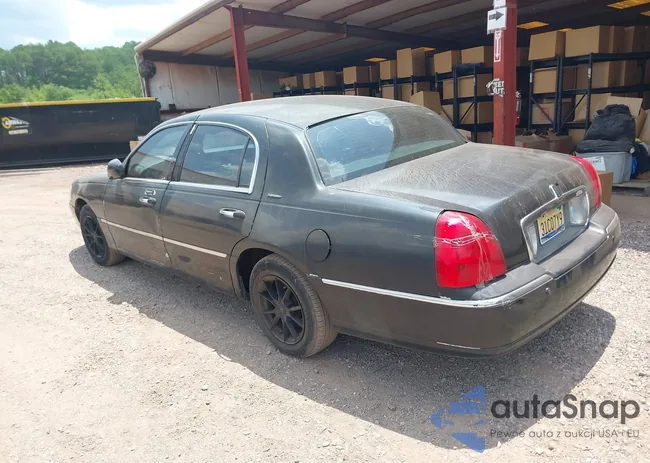 1LNHM82W03Y627175: 42398664