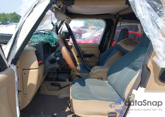 1J4FA59S92P734763: 42411004