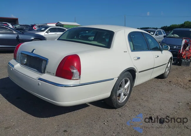 1LNHM83WX4Y631136: 42419783