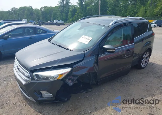 1FMCU0J94HUD49337: 42423686