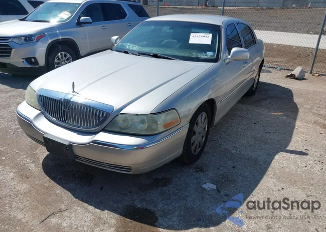 1LNHM82W65Y644453: 42425042