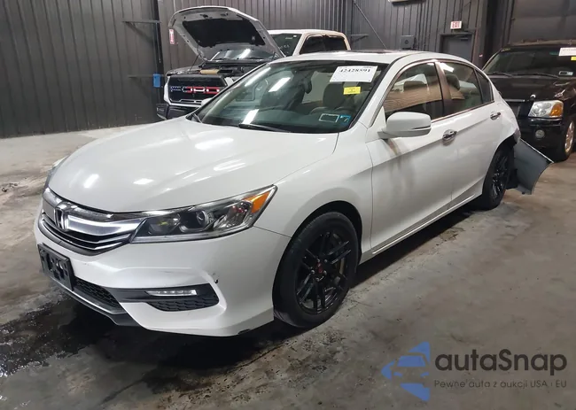 1HGCR2F71GA108815: 42428591