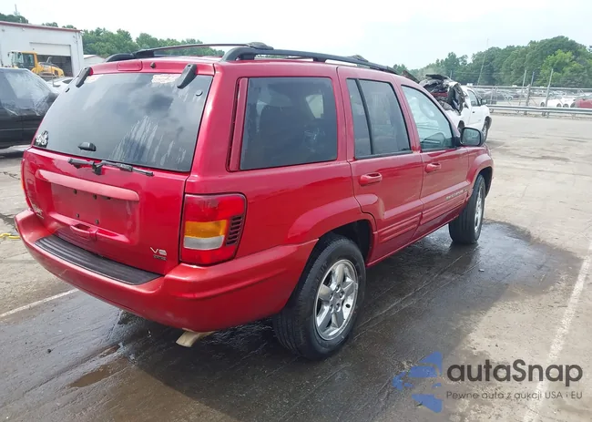 1J4GW58J74C214828: 42434239