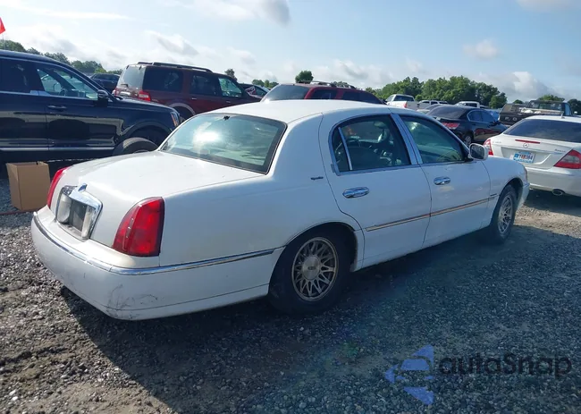 1LNHM82W0XY710627: 42440024