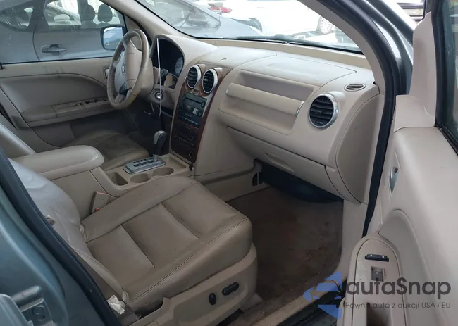 1FMZK06187GA06675: 42440399