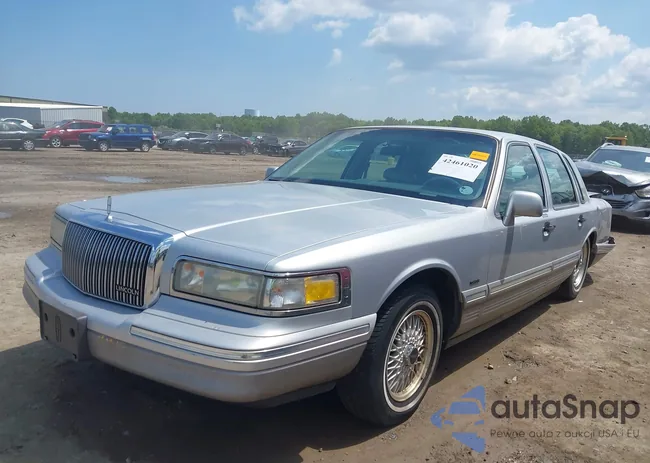 1LNLM82W6SY643714: 42461020