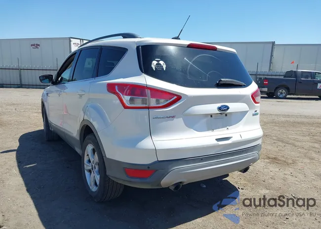 1FMCU0GXXEUA77507: 42488591