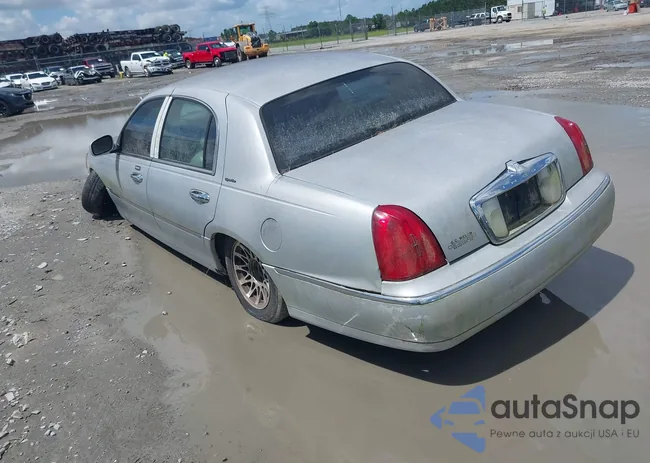 1LNHM82W81Y648935: 42500415