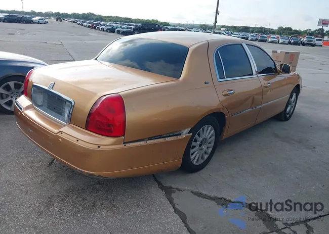 1LNHM83WX3Y633077: 42501273