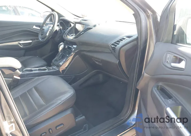 1FMCU9JX2GUA59065: 41758451