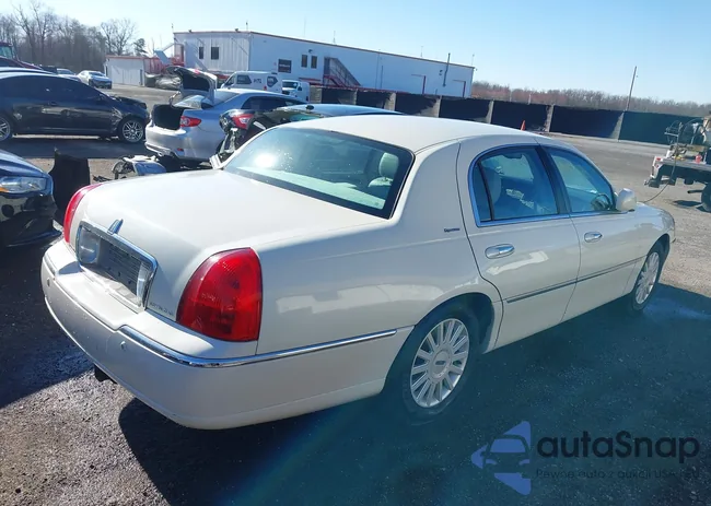 1LNHM81W75Y635214: 41849496