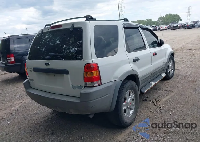 1FMYU031X2KC58217: 42918497