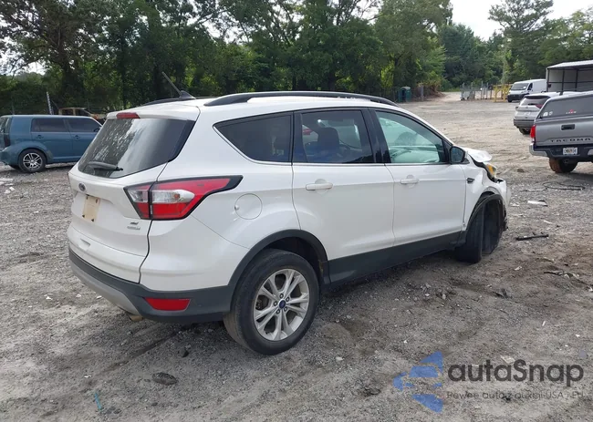 1FMCU0GD4JUA16380: 42963283