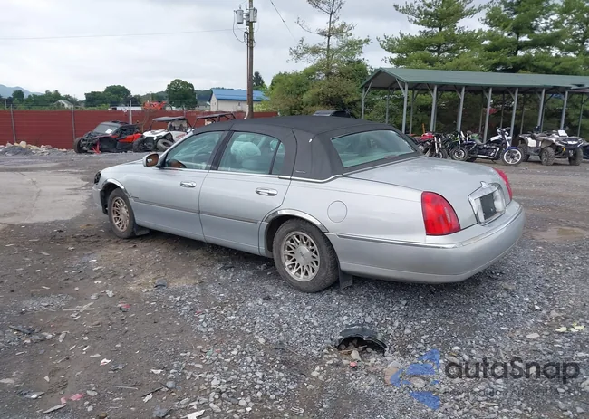 1LNFM82W2XY600959: 42987373