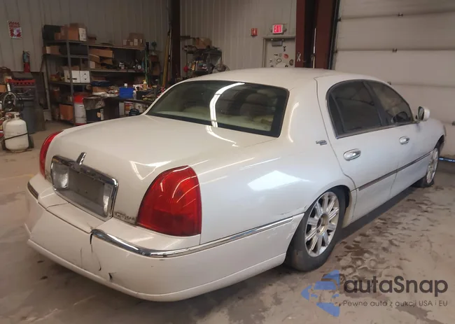 1LNHM82W36Y632276: 42992861