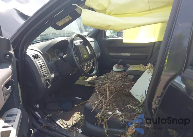 1FMCU93G99KA92558: 42992306