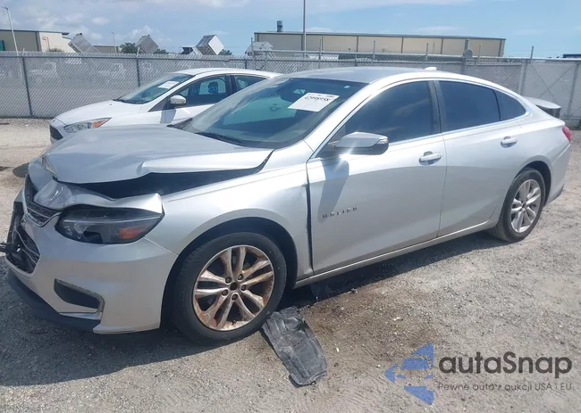 1G1ZE5STXGF293340: 42998958