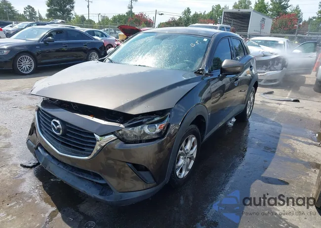 JM1DKDB74G0129124: 43071979