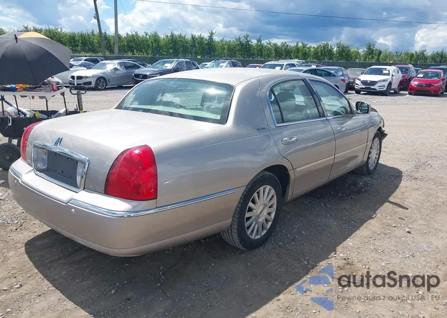 1LNHM82W13Y650707: 43075615