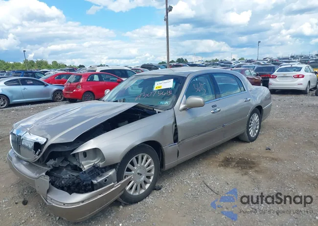 1LNHM82W13Y650707: 43075615