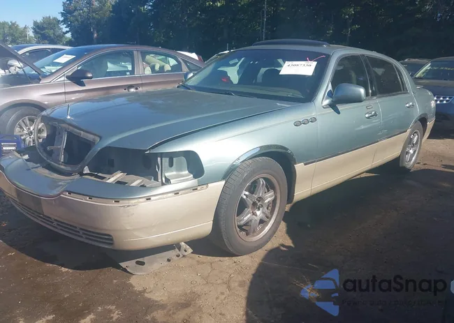 1LNHM82W35Y651456: 43087330