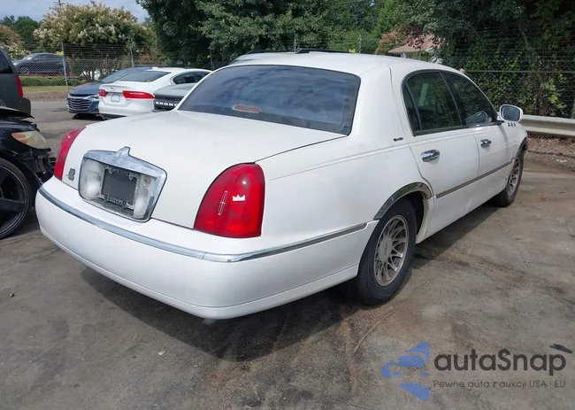 1LNHM82W71Y612332: 43088091