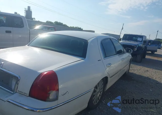 1LNHM81W93Y703123: 43096011