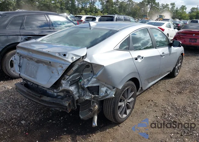 19XFC1F77LE214958: 43125038