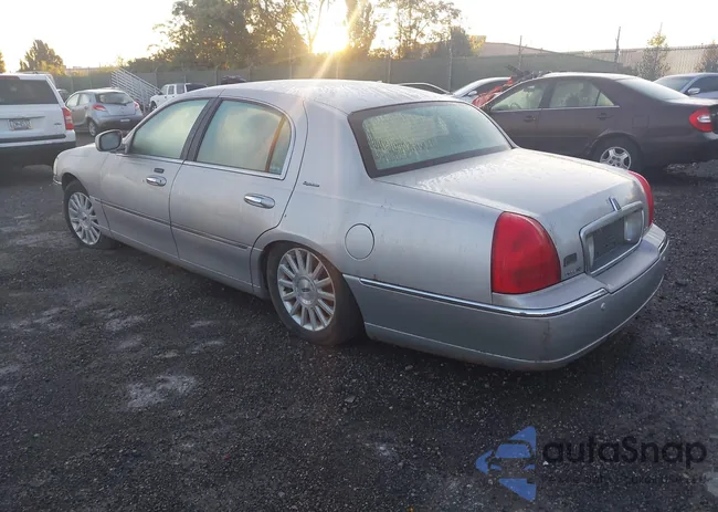 1LNHM82W43Y632928: 43143878