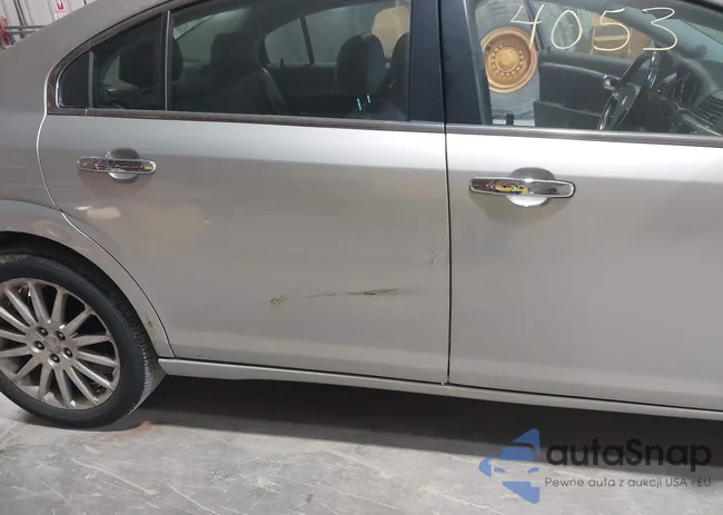 1G8ZX57719F203471: 43184053