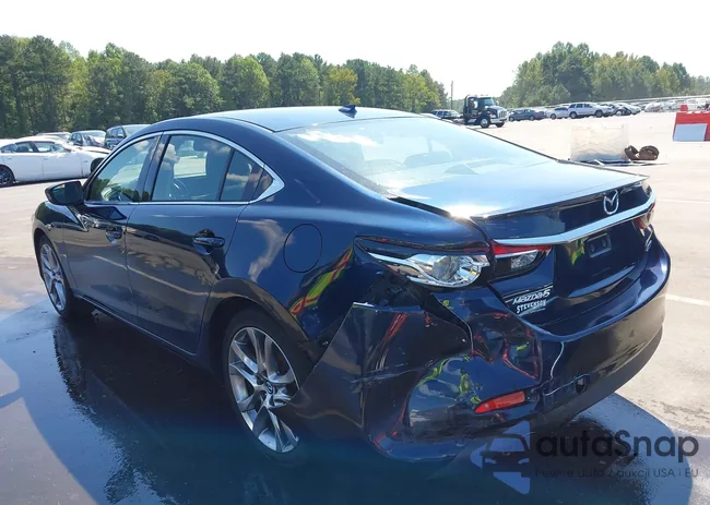 JM1GJ1W50F1182029: 43256638