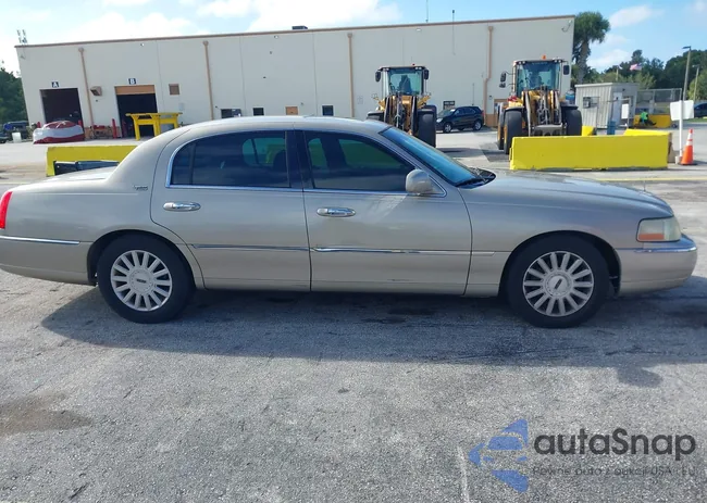 1LNHM82W15Y659801: 43303183