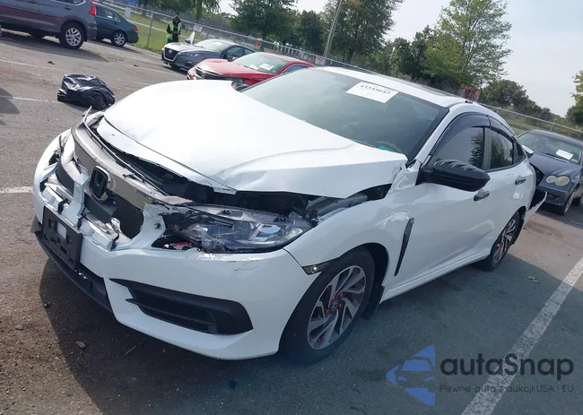 19XFC2F79JE206136: 43345645