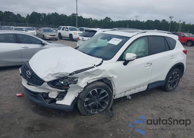 JM3KE2DY8G0844133: 43383535