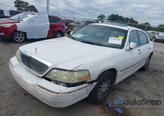 1LNHM82W55Y643908: 43406048