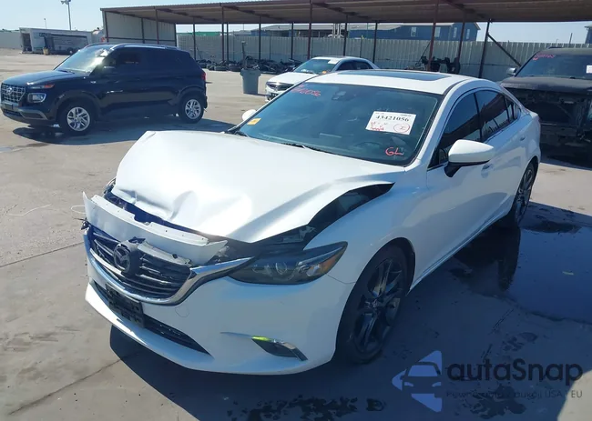 JM1GJ1W55G1476396: 43421056