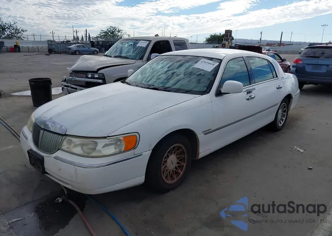 1LNHM82W42Y656838: 43439858