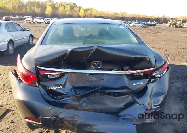 JM1GJ1V60E1162081: 43500182