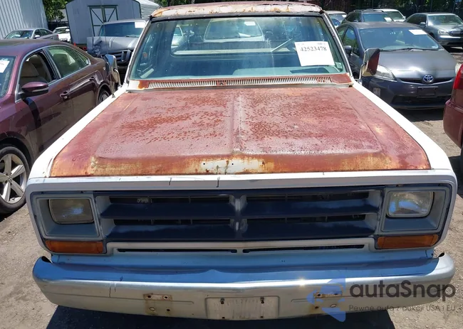 1B7HD14TXHS389456: 42523478