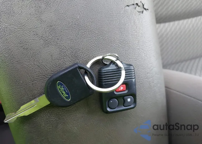 1FMDU77E63UA59921: 42531819