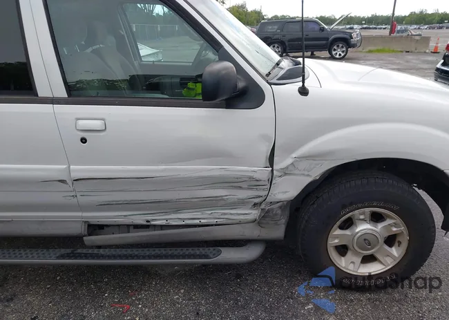 1FMDU77E63UA59921: 42531819