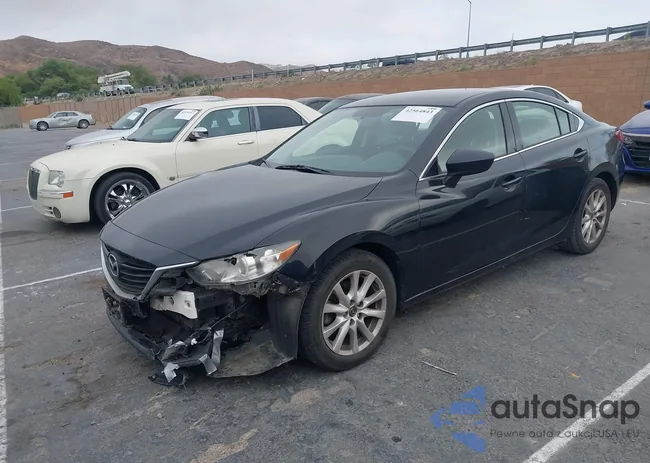 JM1GJ1U5XF1186883: 42564843