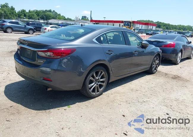 JM1GJ1W50G1454063: 42567615