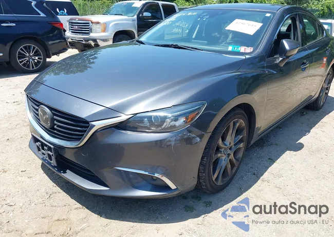 JM1GJ1W50G1454063: 42567615