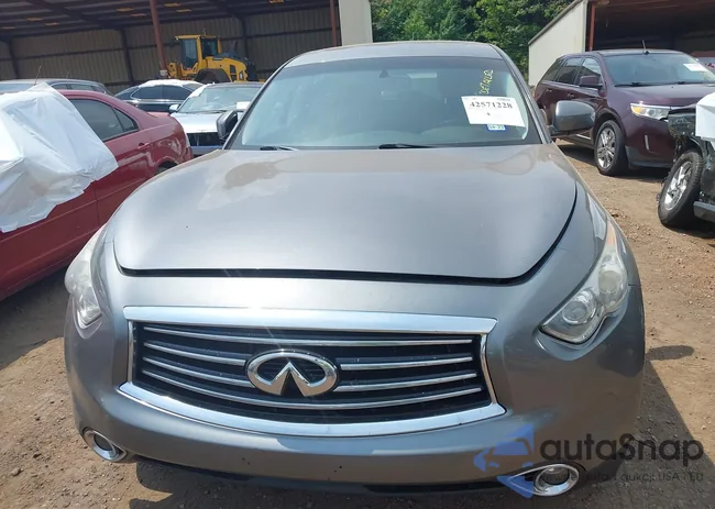 JN8CS1MU4GM671494: 42571228