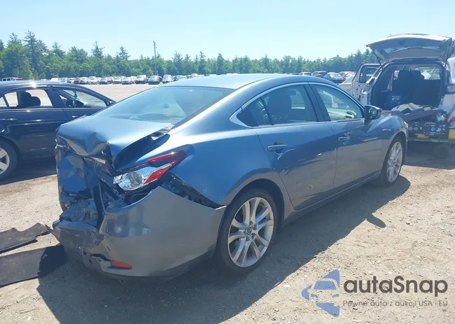 JM1GJ1V65E1131098: 42578459