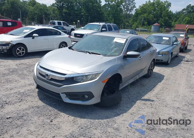 19XFC1F77GE027919: 42582686