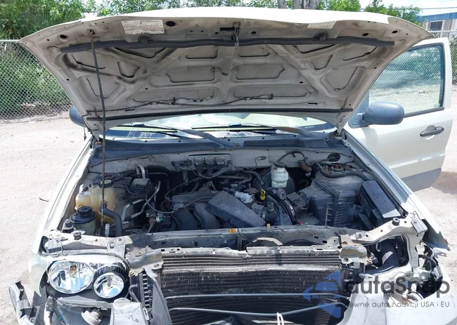 1FMYU03165KB42372: 42586341